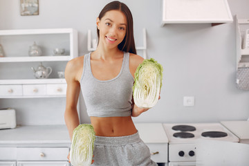 Healthy eating. Dieting and people concept. Brunette with a vegetable.