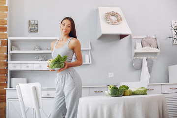 Healthy eating. Dieting and people concept. Brunette with a vegetable.