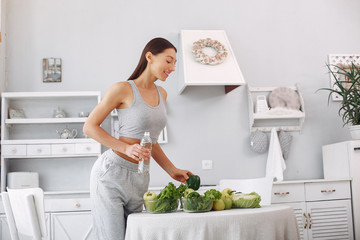 Healthy eating. Dieting and people concept. Brunette with a vegetable.