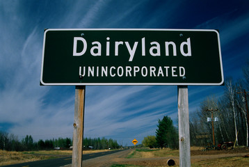 This is a road signs that says Dairyland.
