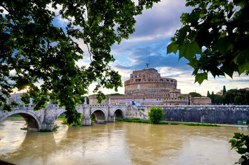 Castel Sant'Angelo and the St. Angelo Bridge located on the Tiber River in Rome, Italy.