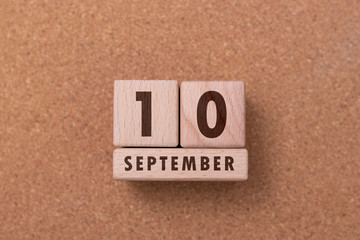 September 10 written with wooden blocks
