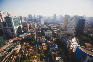 Beautiful wide-angle aerial view of Guangzhou , Guangdong, China with skyline and scenery beyond the city, seen from the observation deck