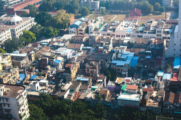 Fototapeta na wymiar Beautiful wide-angle aerial view of Guangzhou , Guangdong, China with skyline and scenery beyond the city, seen from the observation deck