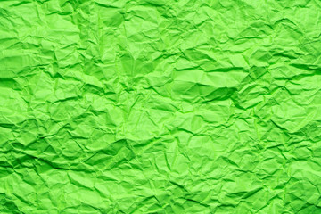 Green crumpled paper background or texture in detail