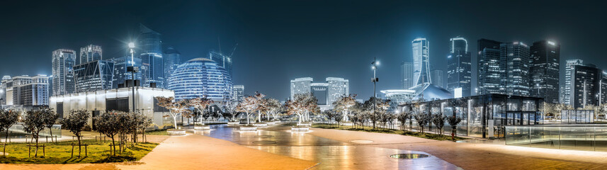 Fototapeta premium Night view of architectural landscape and urban skyline in Hangzhou Financial District..