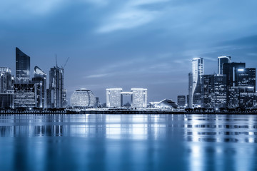 Obraz premium Night view of architectural landscape and urban skyline in Hangzhou Financial District..