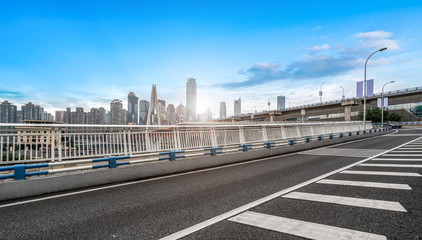 Fototapeta premium Urban road, bridge and urban building skyline..