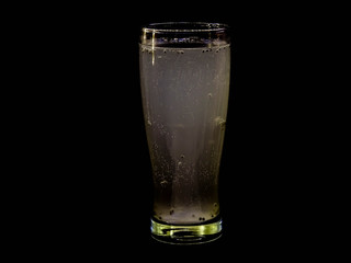 Fresh and cold drink isolated on black background