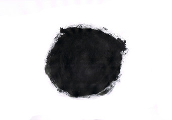 Black abstract ink circles on white paper. Dark Smear.