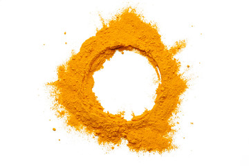 Dry turmeric powder isolated on white background.Close-up of powder orange color turmeric.top view.Circle curry