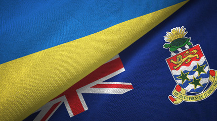 Ukraine and Cayman Islands two flags textile cloth, fabric texture