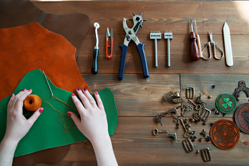 A tool for working with leather. Genuine Leather. Production of genuine leather products.
