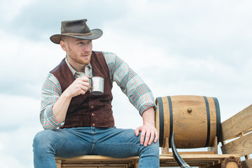 Handsome bearded macho man. Men beauty standard. Example of true masculinity. Cowboy wearing hat....