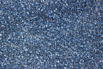 close up of grey gravel, pea gravel, textured backgroind