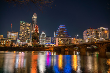 View of the Austin Skyline Reflecting on Lady Bird Lake At Night