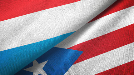 Luxembourg and Puerto Rico two flags textile cloth, fabric texture