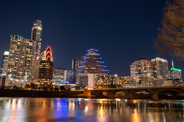 Fototapeta na wymiar View of the Congress Ave Bridge With The Illuminated Downtown Austin In the Background