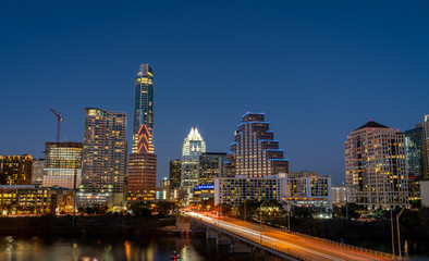 Obraz premium Aerial View of Downtown Austin At Night With Congress Bridge in the Foreground