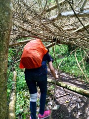 Women adventure, trekking on difficult way