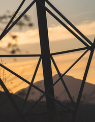 Abstract Photograph of A transmission tower or power tower,  a tall structure, usually a steel lattice tower, used to support an overhead power line