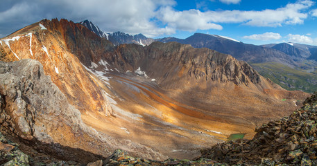 Mountain landscape. Canyon and colored rocks. Mountain pass, trekking. Panoramic view.