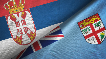 Serbia and Fiji two flags textile cloth, fabric texture