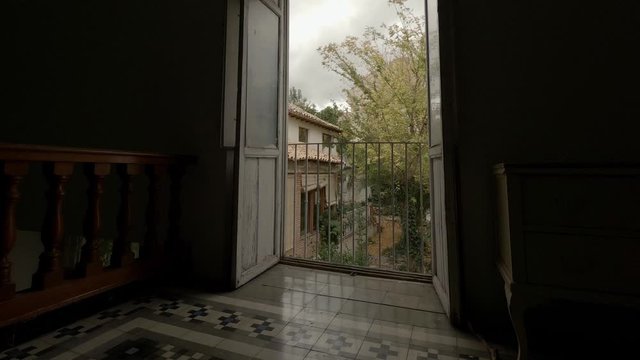 Time Lapse - Overlooking Garden from hotel room on a Stormy Day. Spain. 