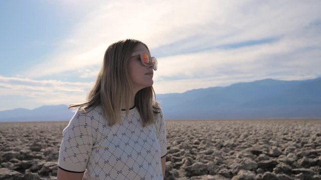 Inspirational Travel and adventure tourism young woman holidays explores desert
