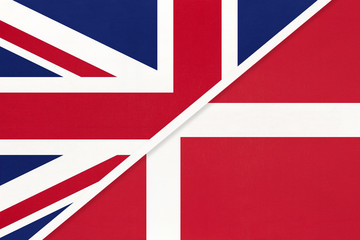 United Kingdom vs Denmark national flag from textile. Relationship between two european countries.