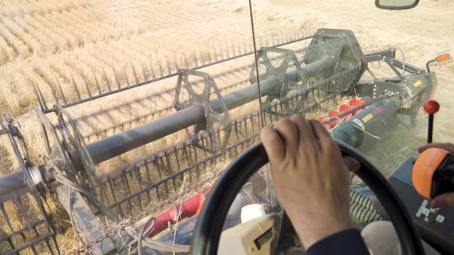 Inside the cab of a windrower