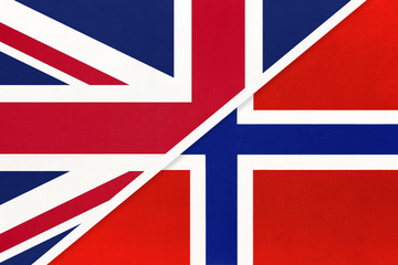 United Kingdom vs Norway national flag from textile. Relationship between two european countries.
