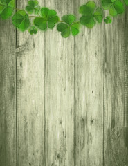 St.Patrick Day Template with Green Wood Background and Shamrock Wreath.