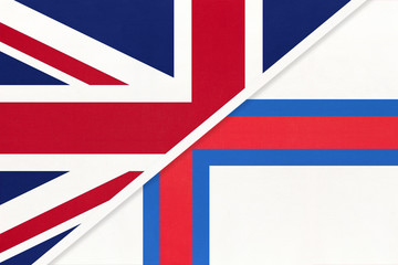 United Kingdom vs Faroe Islands national flag from textile. Relationship between two european countries.