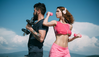 Sporty couple. Start daily workout. Sexy slim active couple with straight body sportswear outdoor blue sky background. Regular workout. Health care. Fitness lifestyle. Favorite sport. Workout result
