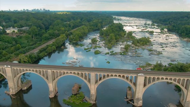 Aerial: Railroad Bridge crossing the James River. Richmond, Virginia, USA