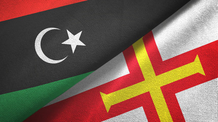 Libya and Guernsey two flags textile cloth, fabric texture