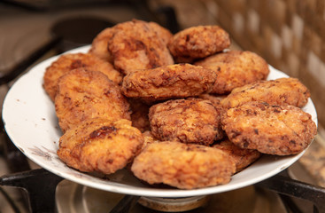 Meat patties fried in a pan