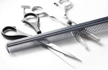 Scissors and combs for cutting hair