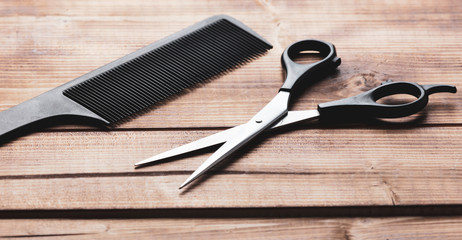 Scissors and combs for haircuts