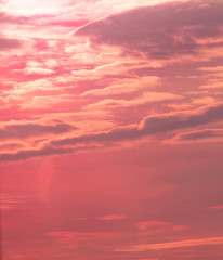Naklejka na ściany i meble Colorful clouds at dawn of the sun