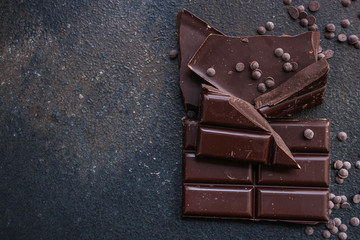 chocolate (delicious cocoa dessert, pieces of sweets) menu concept. food background. top view. copy...