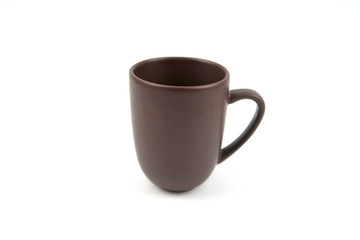 Brown ceramic mug isolated on white background