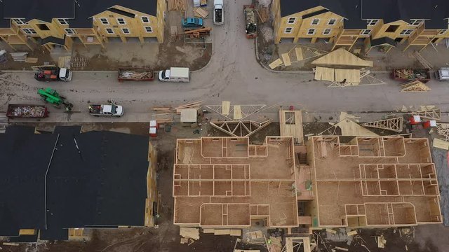 Rising aerial view over new housing development apartments to meet with the demand of the growing population.