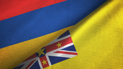 Armenia and Niue two flags textile cloth, fabric texture