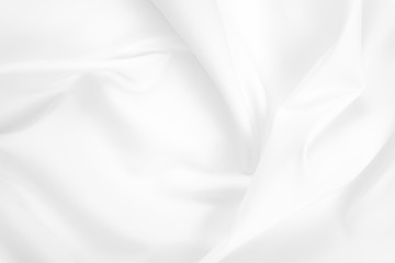 Abstract white fabric texture background. Cloth soft wave. Creases of satin, silk, and cotton.	