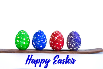 Painted Easter eggs in bright colors on a white background. Easter photo.