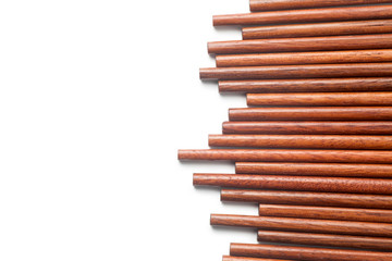 Obraz premium Wooden chopsticks isolated on white background
