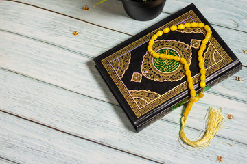 Quran on Wooden Background. Ramadan is coming
