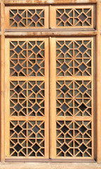 Detail of traditional iranian window wooden carved shutter